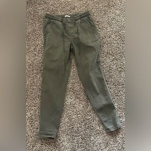 Green jeans with tie